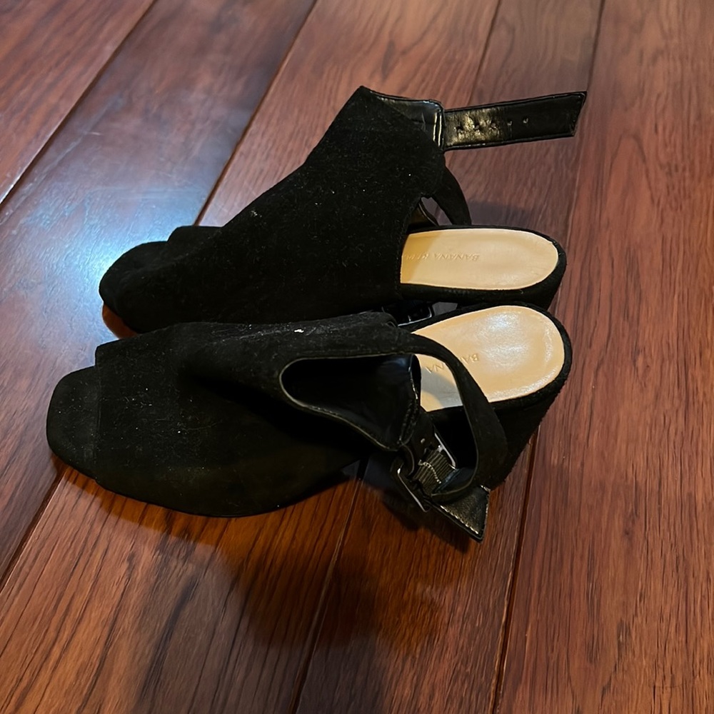 Open toed black high heels